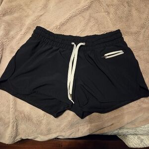 Vuori Women's Black Clementine Lined Running Shorts with Zip Pocket